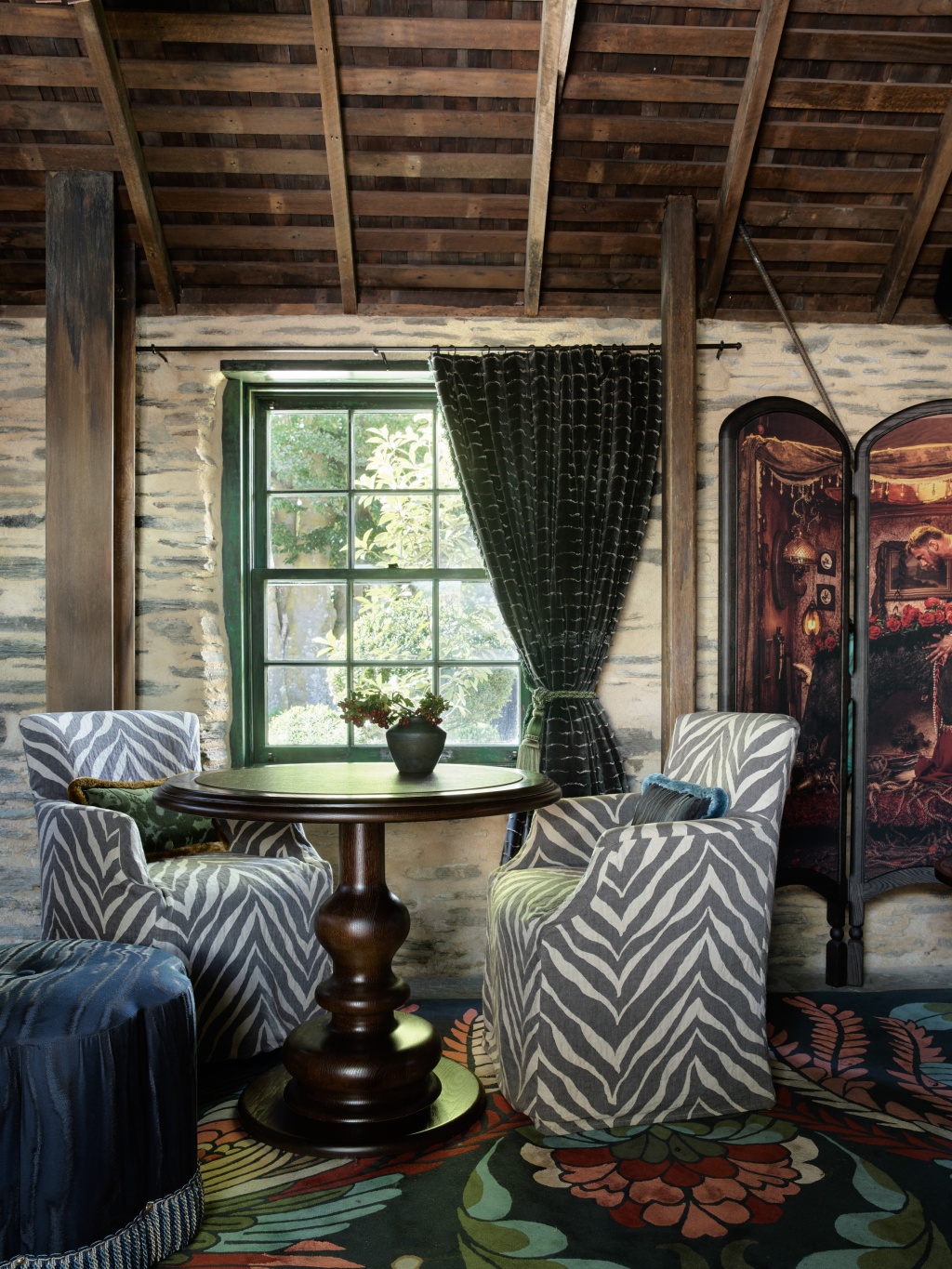 Two zebra print armchairs in the Burr Bar.